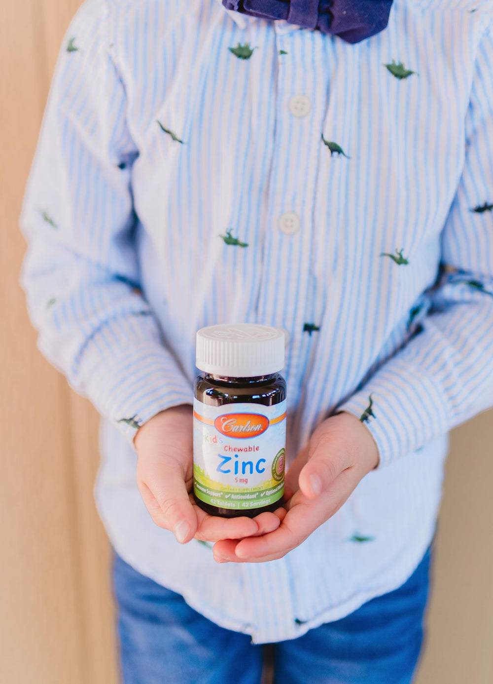 Child selecting Carlson Kid's zinc chewables