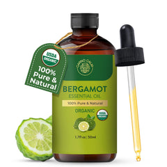 Bergamot essential oil close-up with bottle and label