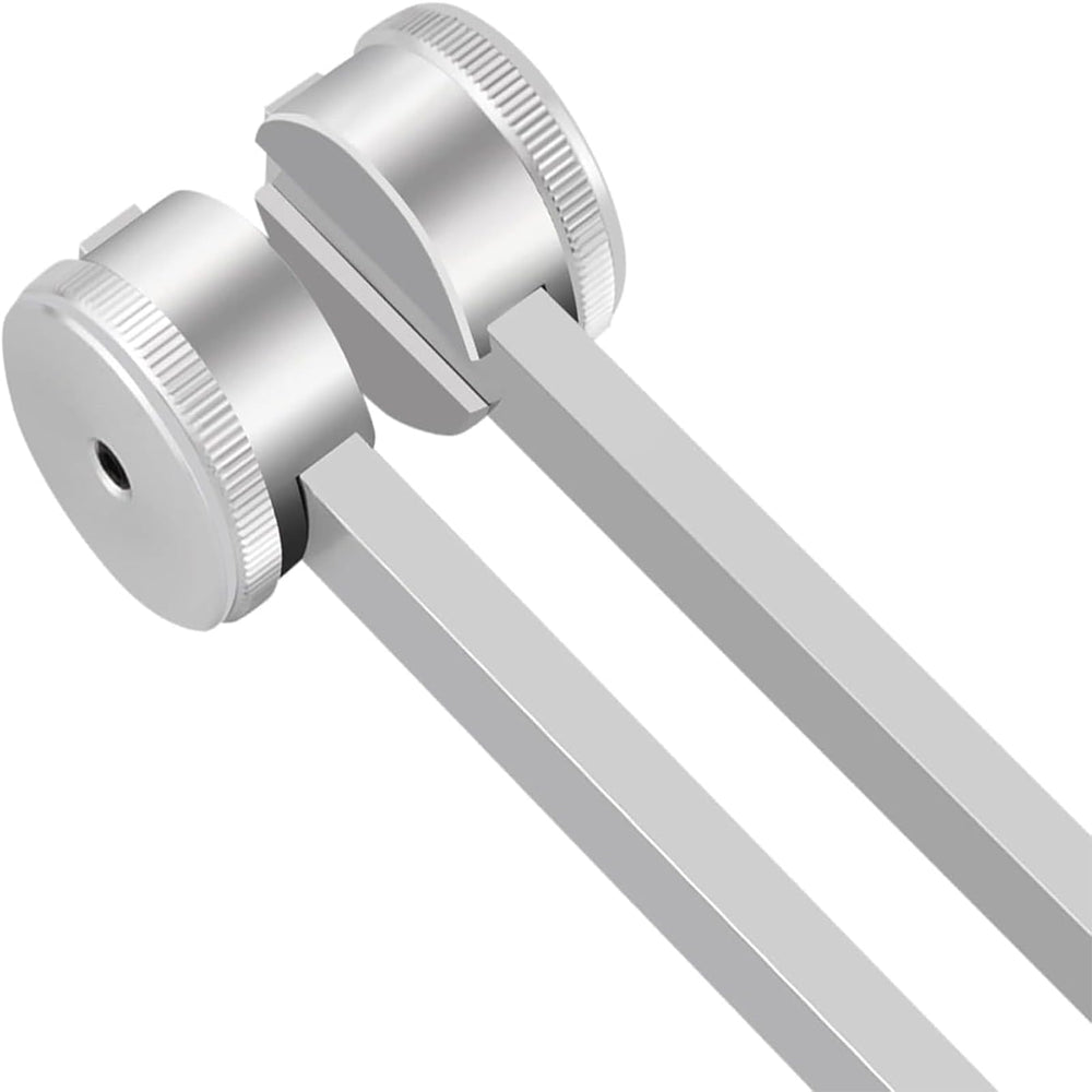 CBCJIEHUXL tuning fork placed on body for vibration-based relaxation.
