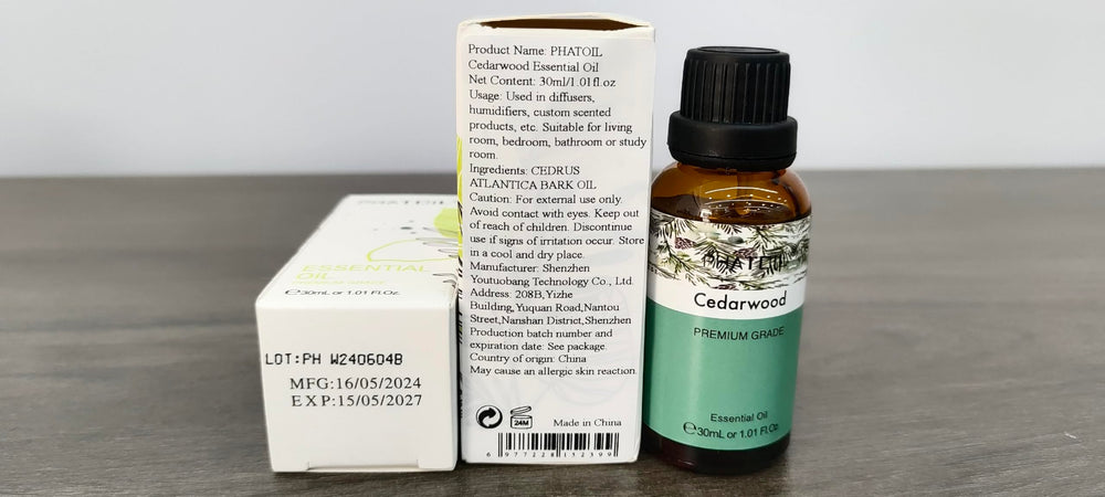 Close-up of cedarwood essential oil bottle label