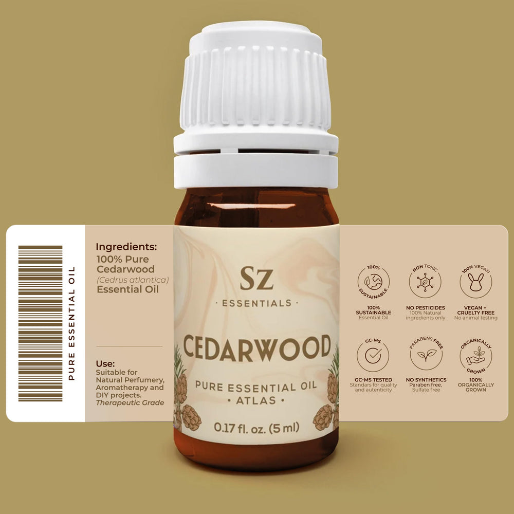 Close-up of Cedarwood essential oil bottle with Cedrus atlantica label.