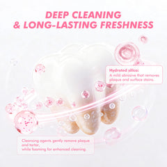 Close-up of toothpaste gel with pink cleansing specks