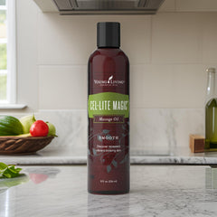 Close-up of Cel-Lite Magic Massage Oil bottle on white background