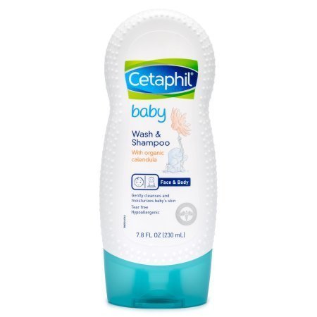 Baby wash and shampoo lathering in hand with Organic Calendula
