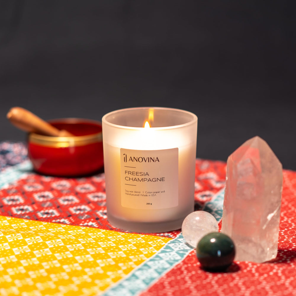 Bedroom setup with Champagne Toast Candle in use