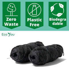 Close-up of activated charcoal floss strands
