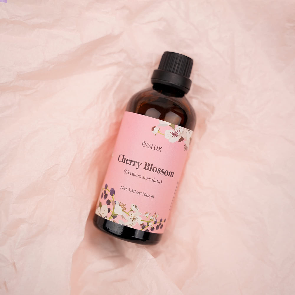 Packaging and 100ml bottle of Cherry Blossom Essential Oil