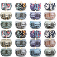 Assorted Christmas scented candle tins in a 24-pack collection