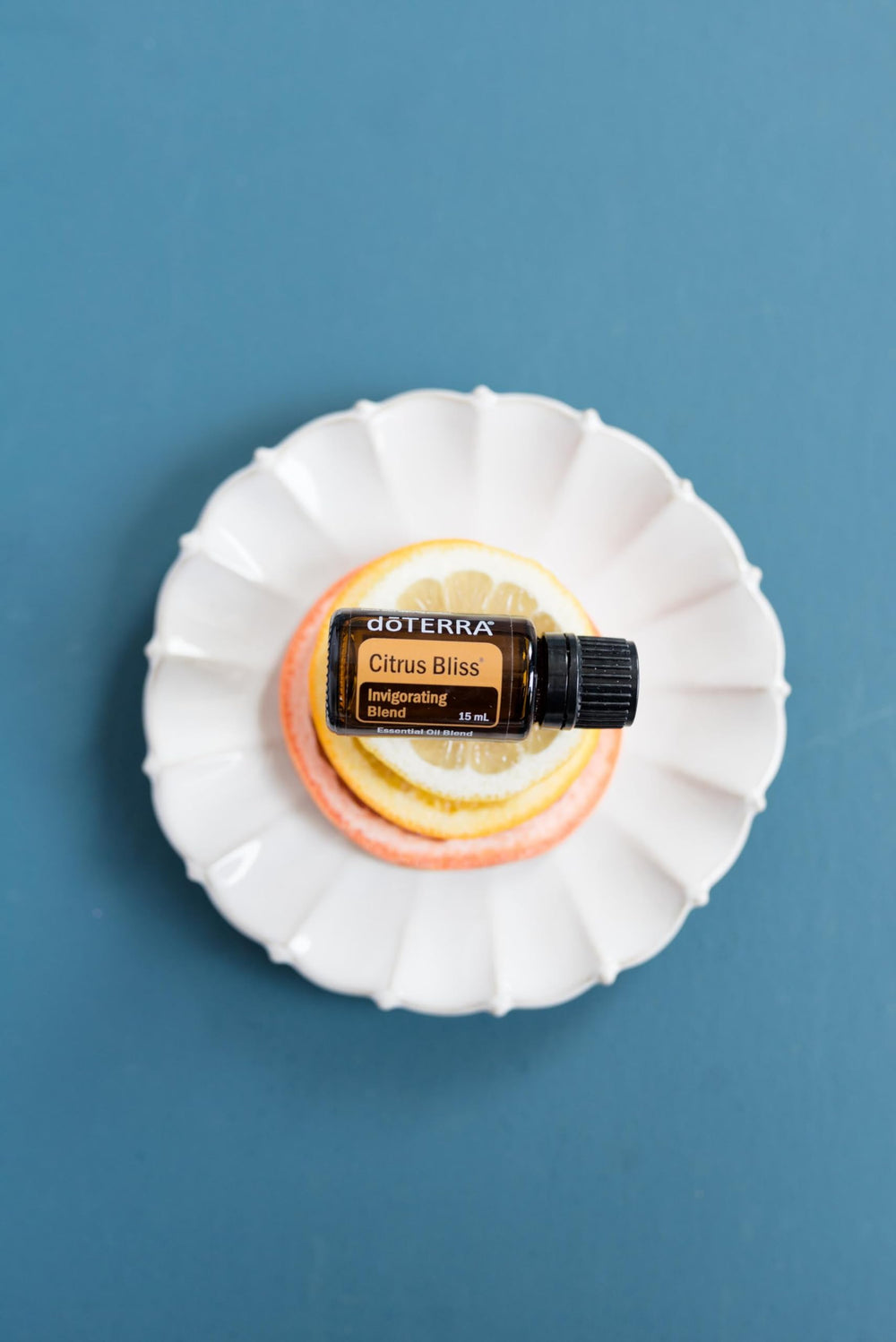 Close-up of Citrus Bliss bottles and fresh citrus imagery