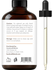 Close-up of Handcraft Blends Clove Essential Oil bottle