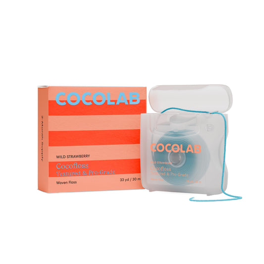 Close-up of Cocofloss woven dental floss texture with 500+ interwoven threads.