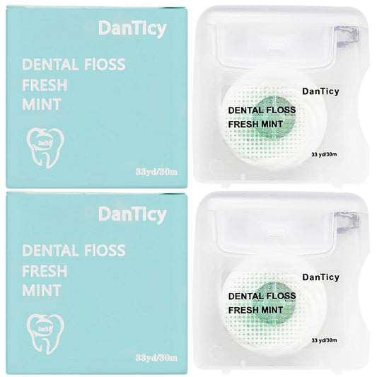Close-up of coconut oil dental floss for wide spaces