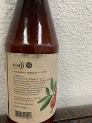 Texture close-up of CODi Pomegranate Lotion on skin