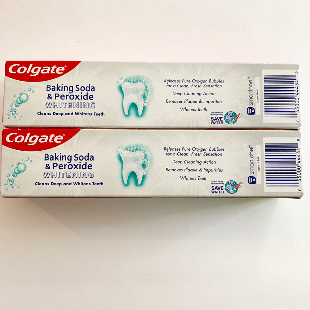 Close-up of toothpaste gel being squeezed from a 4 oz tube