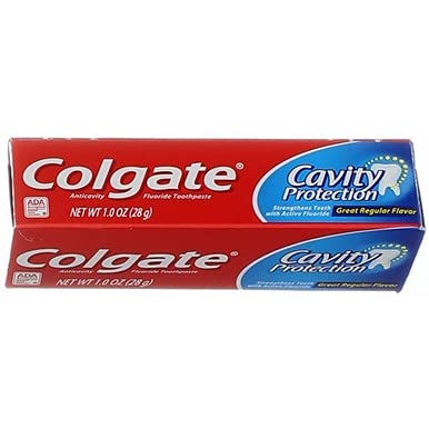 Illustration of Colgate Cavity Protection toothpaste tubes in regular flavor