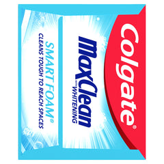 Foaming toothpaste on a toothbrush showing whitening foam