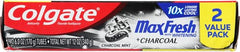 Lifestyle image of brushing teeth with Colgate Max Fresh Charcoal Mint