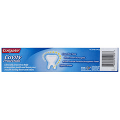 Three-tube Colgate Cavity Protection toothpaste package with mint packaging