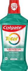 Side view of Colgate Total Advanced Pro-Shield Mouthwash Spearmint 33.8 oz bottle