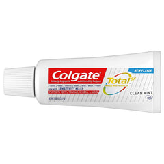 Close-up of toothpaste being dispensed onto a toothbrush