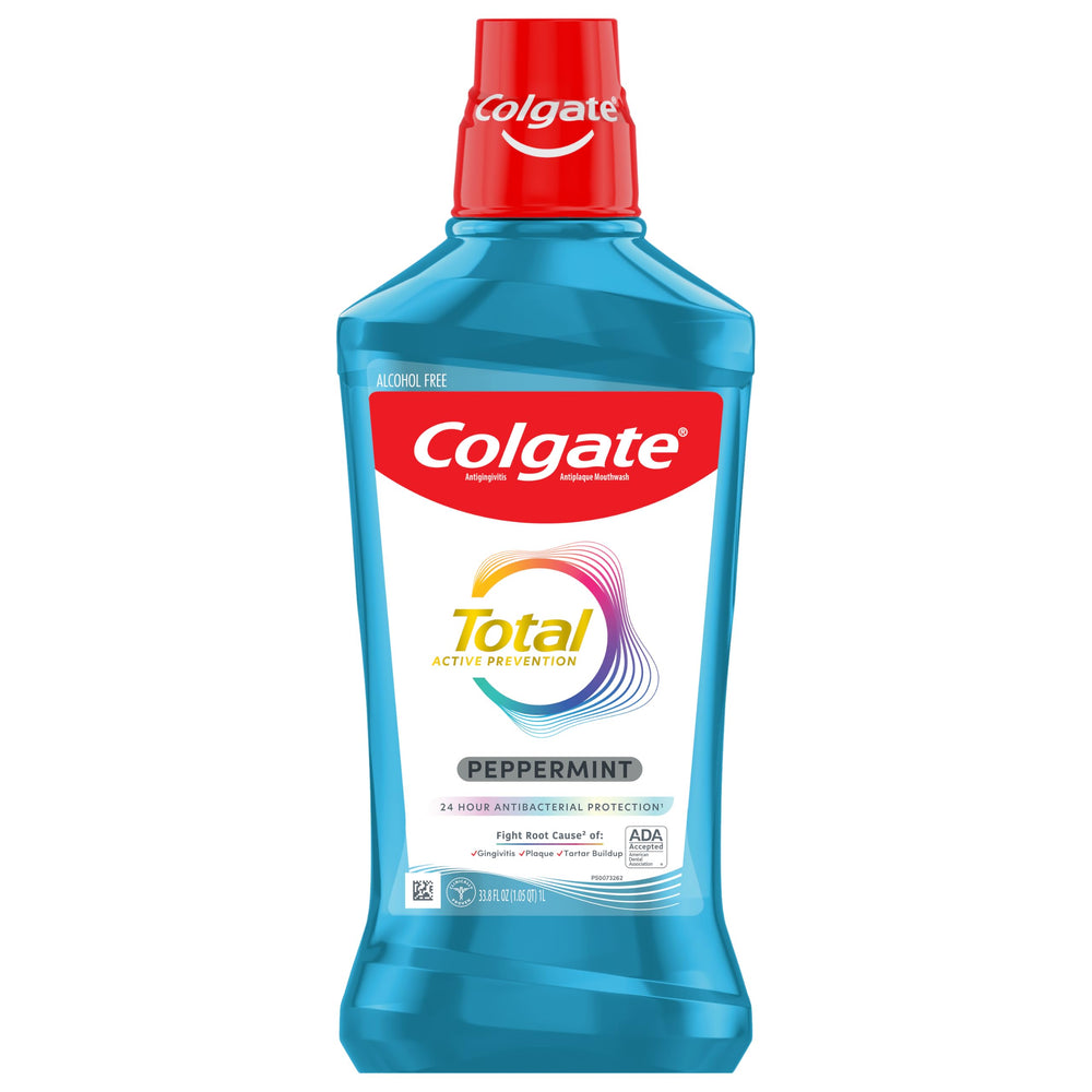 Colgate Total Peppermint Mouthwash paired with toothpaste and toothbrush