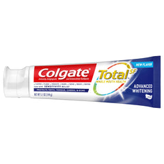 Open tube of Colgate Total Whitening toothpaste