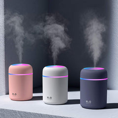 Colorful Mini USB Humidifier pink top view showing mist outlet