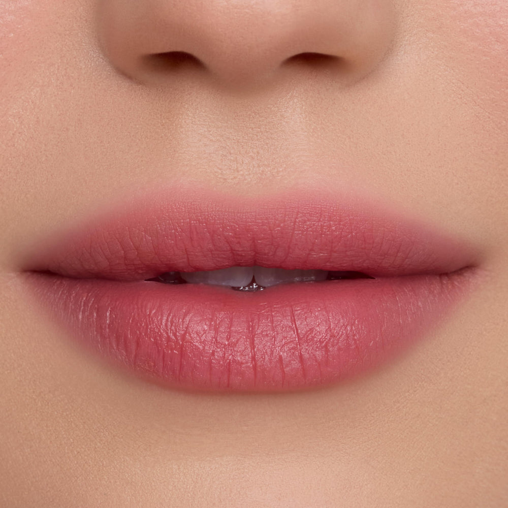 Texture closeup of ColourPop Cloud Whip reveals whipped, light lip feel.