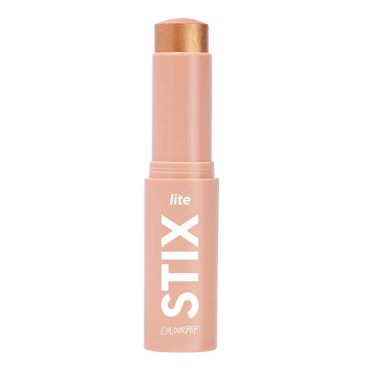 ColourPop Lite Stix highlighter on cheekbones for a soft, dewy radiance