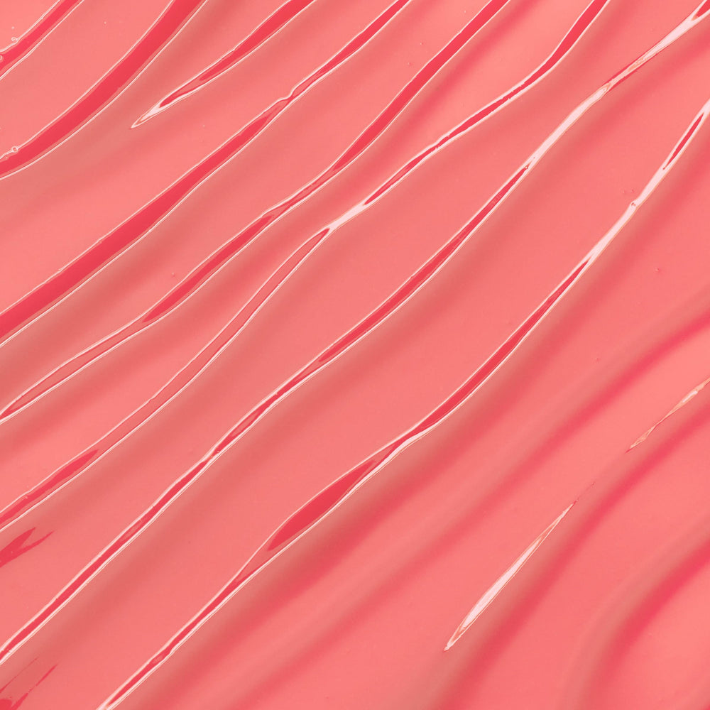 ColourPop Lux Lip Oil swatch-pink delivers a glossy finish with a lightweight feel.