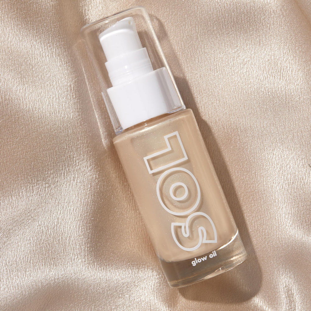 ColourPop Mini Glow Oil on skin highlighting dewy glow and coconut-scented hydration