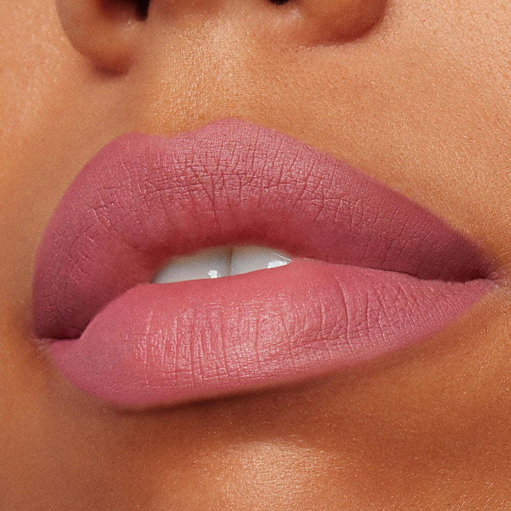 ColourPop PowerPout Matte Lipstick application swatch reveals full-coverage color in one swipe