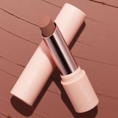 PowerPout packaging features ColourPop branding and sleek cap.