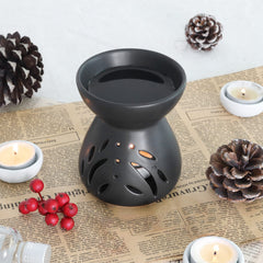 Hollow-out design allowing tealight light to shine through
