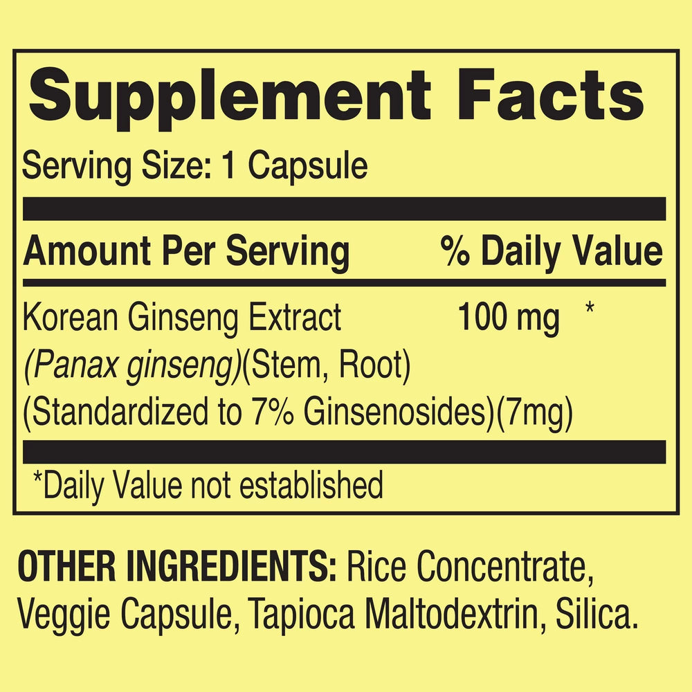 Open bottle with vegetarian capsules spilling onto a surface