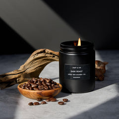 Soy wax candle in clear jar with dark roast coffee label