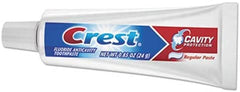 Close-up of Crest toothpaste showing enamel strengthening and mint flavor
