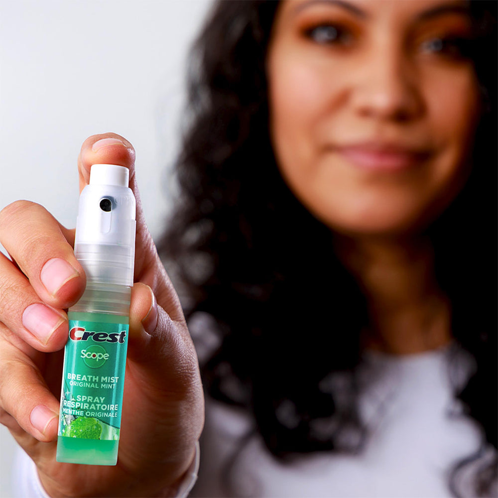 Side view of Crest Scope Mint Breath Mist 4-pack