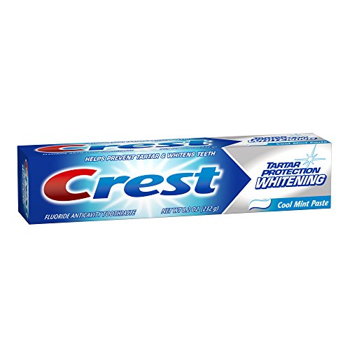 Close-up of toothpaste tube cap and dispensing end