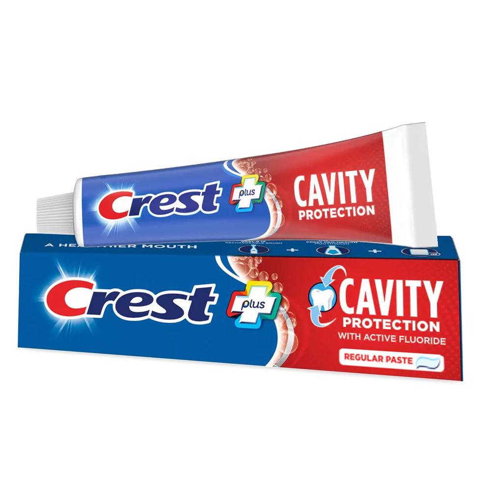 Toothbrush with Crest toothpaste paste for brushing