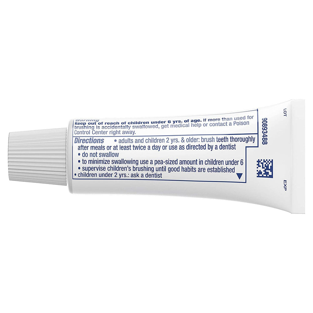 Close-up label of Crest Complete Whitening Scope mint toothpaste
