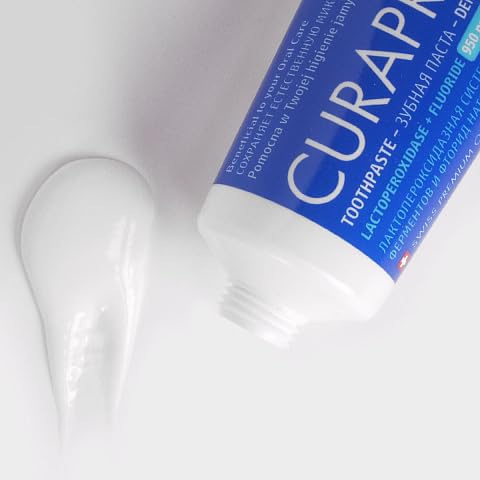 Close-up of Curaprox Enzycal 950 ppm label on the tube