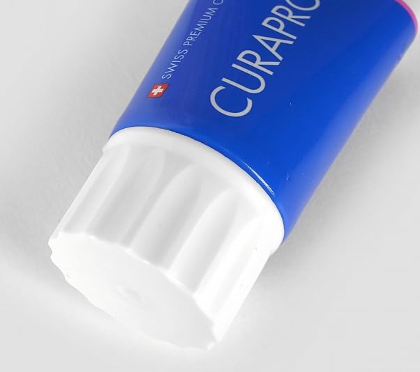 Strawberry flavored kids toothpaste tube