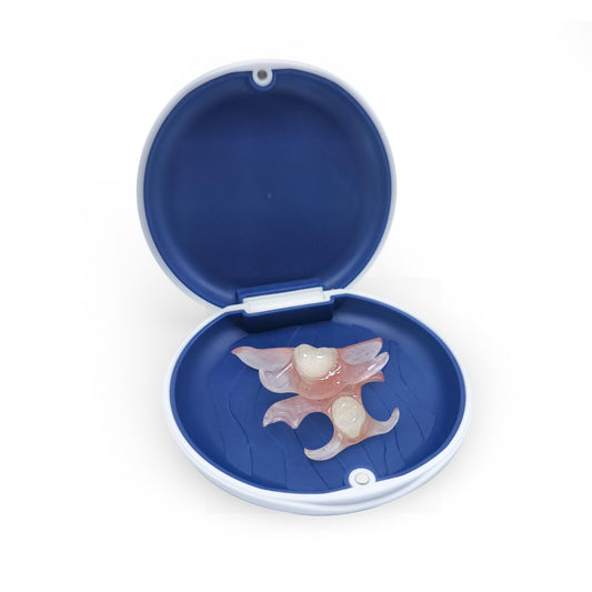 Custom partial denture fitting over lower teeth