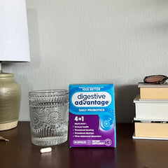 Probiotic capsule beside yogurt texture comparison