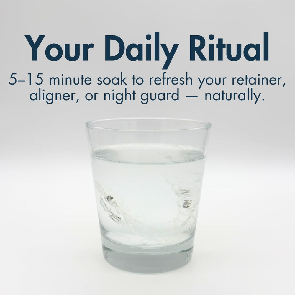 Retainers and aligners being refreshed in a gentle cleansing solution