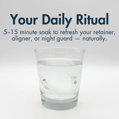 Retainers and aligners being refreshed in a gentle cleansing solution