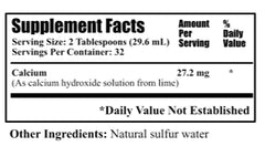 Product label close-up showing saturated calcium hydroxide in sulfur water