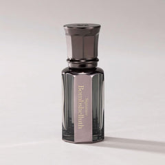 Daniel's Truth Bombshelluth roll-on bottle close-up for easy on-the-go fragrance touch-ups.