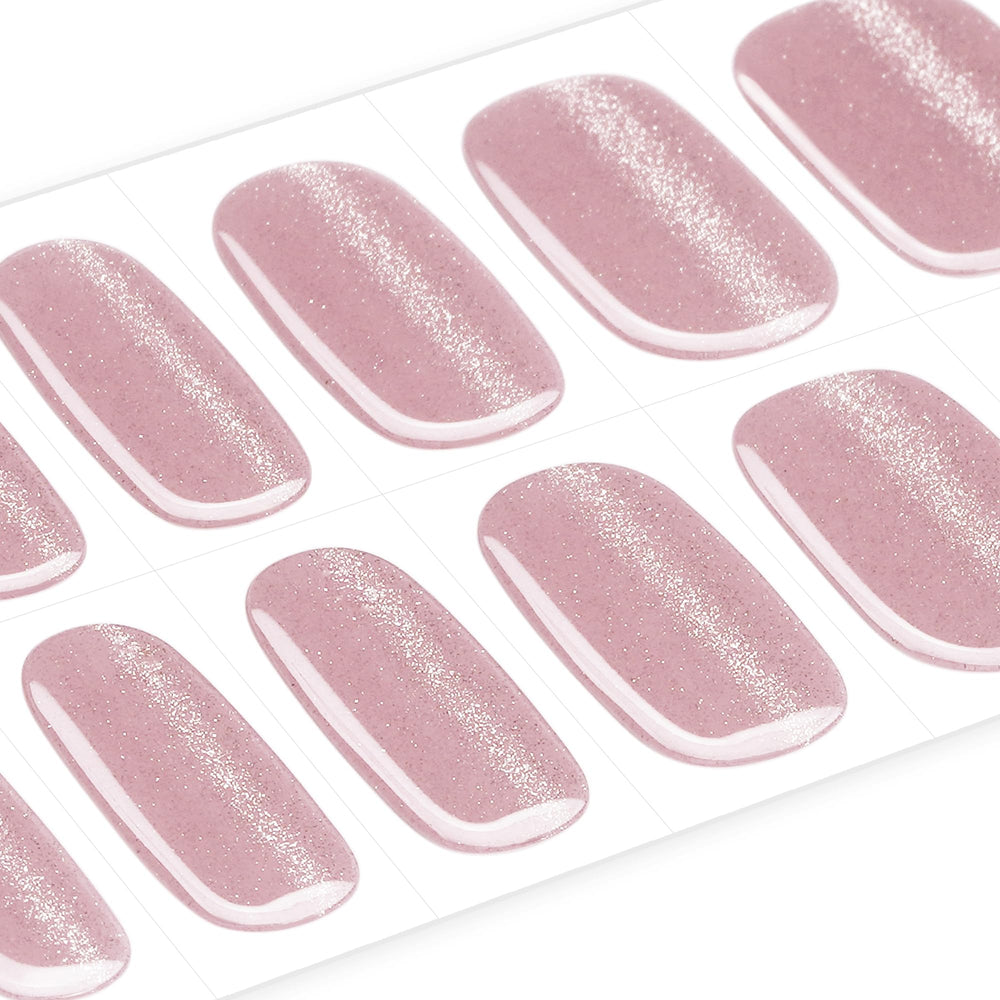 Easy application and removal demonstrated on a fingertip with nail wrap.